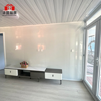 Maison conteneur extensible Hebei étanche de 40 pieds avec cuisine à toit plat, double aile, pièce pliante, salon et usage supermarché