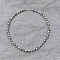 Rehaussez vos bases : collier en perles grises, pendentif solitaire en argent sterling 925, intemporel et polyvalent pour transformer vos looks quotidiens
