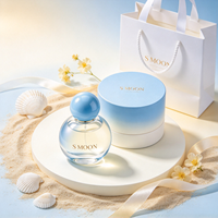Nouvelle conception, flacon de parfum en verre mignon de 50 ml et 100 ml avec bouchon à bille coloré et boîte, flacon en verre vide personnalisé de 30 ml et 75 ml pour parfum