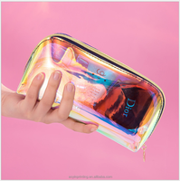 Pochette de rangement cosmétique de voyage en gros, forme coquillage irisée, sac de maquillage holographique étanche avec fermeture éclair pour femmes en voyage en extérieur