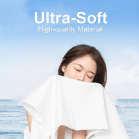 Serviette de bain jetable portable en coton à séchage rapide, technique tissée à forte absorption d'eau pour hôtels, débarbouillettes magiques, vente en gros
