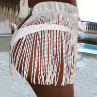 Mini-jupe sexy à sequins et franges avec ceinture pour club, bar, performance, style urbain, jupe trapèze en fibre de polyester, jupe courte