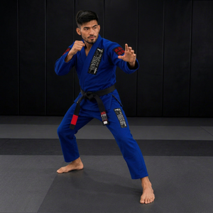 Kimono BJJ bleu pour homme, coupe classique, 100% coton, uniforme d'arts martiaux avec design durable et broderie personnalisée. - Product Image 1