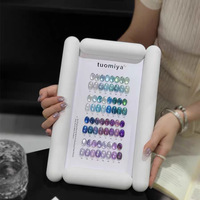 Ensemble de vernis à ongles en gel durable Tuomiya 32 couleurs Monet bleu-violet effet œil de chat, emballage de base, kit professionnel pour salons de manucure