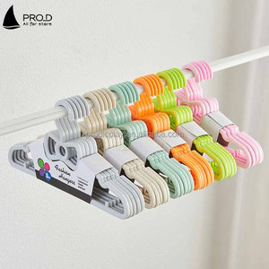 Organizador de armario para habitación de niños, perchas de plástico con forma de lazo para ropa - Product Image 5
