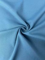 Tela de punto tricot elástica en 4 direcciones de 185GSM de secado rápido, suave y transpirable para ropa de playa y deportiva, ideal para bikinis, al por mayor.