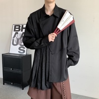 Chemise décontractée à manches longues plissée irrégulière pour homme, noire unie, coupe ample, style streetwear, haut tendance pour le quotidien