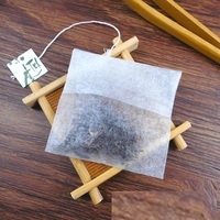 Sachets de thé jetables thermoscellés en fibre de maïs, sachets filtrants pour thé aux fleurs de médecine traditionnelle chinoise, sachets de thé vides
