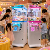 Vente en gros usine RuiKe RK Mini machine à griffes commerciale à monnayeur avec éclairage LED pour attraper les poupées