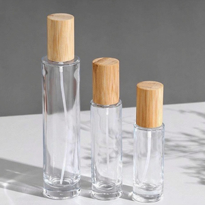 Botella de Perfume de vidrio transparente cilíndrica de alta calidad 30ml 50ml 100mL cuello de tornillo tapa de madera de bambú atomizador Uso de viaje - Product Image 4