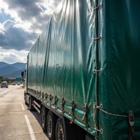 Bâche de camion et de remorque 1000D 20x20 600-900GSM en polyester non tissé PVC 100% robuste, anti-UV, unie et imperméable