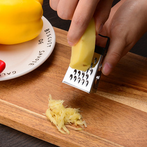เครื่องมือครัวสแตนเลสแบบใช้มือ ที่ขูดชีสและผักสี่ด้าน - Product Image 4