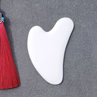 Outil de grattage coréen Produits de massage Anti-rides pour les yeux Vente en gros de massage personnalisé Planche de gua sha blanche Outil de grattage de gua sha en céramique