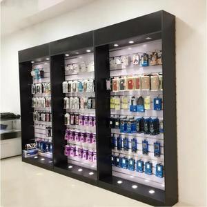 ตู้โชว์อุปกรณ์เสริมโทรศัพท์มือถือติดผนังสีดำ พร้อมไฟสปอตไลท์ LED และชั้นวางแบบโมดูลาร์ สำหรับตกแต่งร้านค้าปลีก - Product Image 1