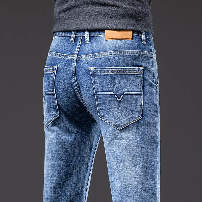 Nuevo estilo Regular Fit Pantalones Business Casual Estilo clásico Moda Denim Pantalones Hombres Mid Jeans Stretch