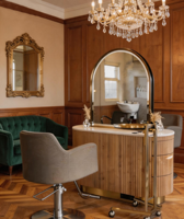 Miroir de coiffure de salon de coiffure moderne et unique en forme ronde dorée double face avec table de maquillage