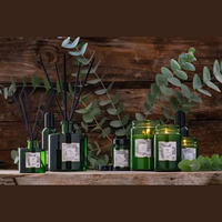 Mescente vente en gros bouteille en verre noir bâtons de rotin parfum naturel fleur huile essentielle diffuseur de roseau