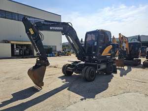 Excavatrice sur pneus Hyundai HW60A d'occasion d'origine coréenne, vitesse de conduite rapide, système hydraulique stable, mini-équipement de terrassement - Product Image 1