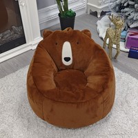 Fauteuil pouf Helios au design moderne en forme d'ours, avec dossier capitonné portable et sécurisé, idéal pour les enfants et les salons.