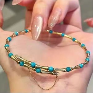 Pulsera de Oro Amarillo de 18K con Turquesa Xinfly, Brazalete Elegante con Forma de Bambú, Joyería Fina - Product Image 1