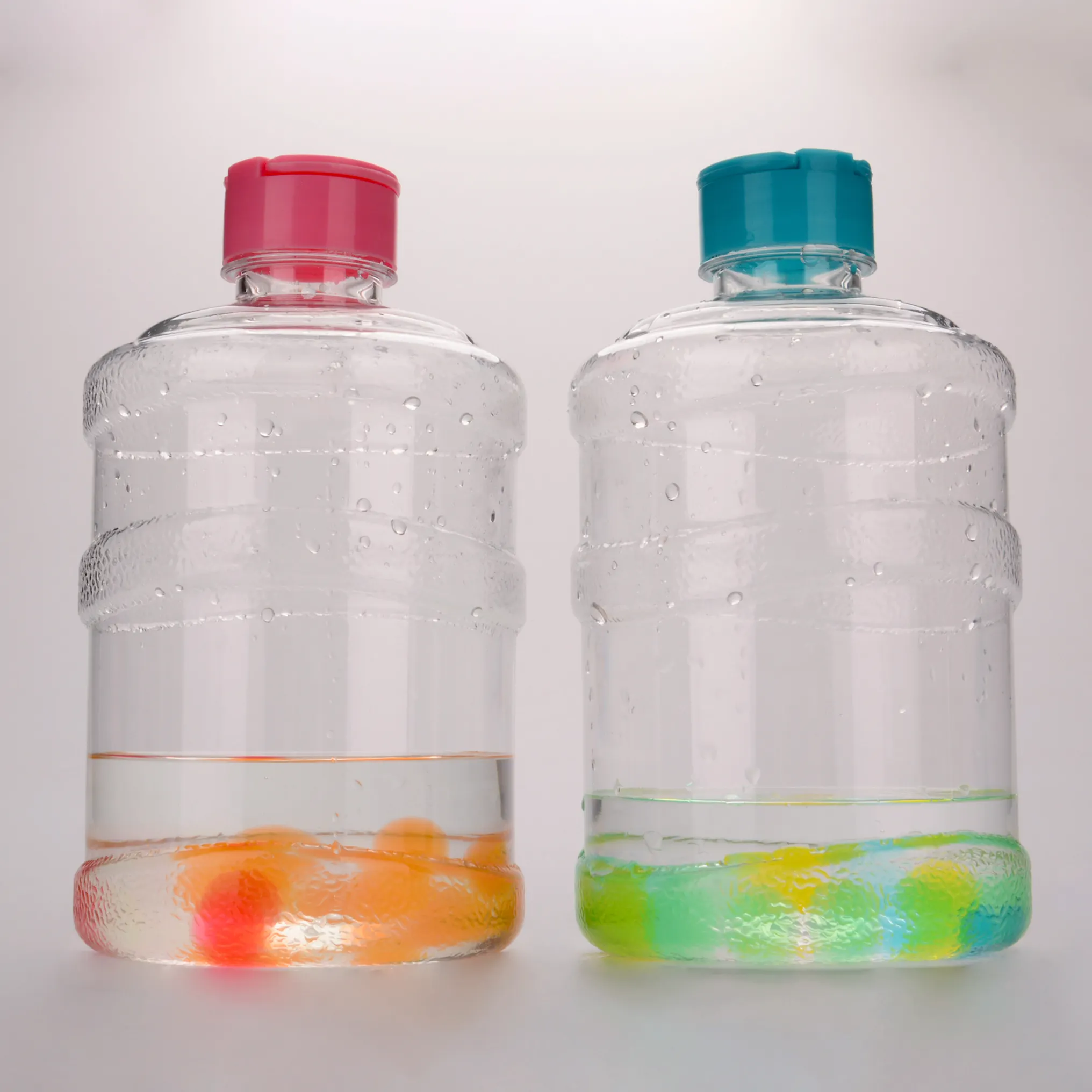 Vendita calda 1L 1000ml PET secchio trasparente bottiglia d'acqua bottiglia di succo di plastica bottiglia per bevande 1L secchio con anello a mano