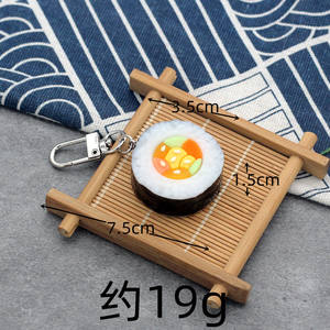 Llavero creativo al por mayor con diseño de bola de arroz de sushi simulada, juguete divertido de comida de sushi con algas, llavero de dibujos animados de PVC impermeable para coche o bolso - Product Image 6