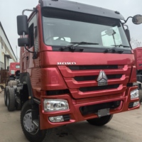 Camion tracteur SINOTRUK HOWO 6x4 d'occasion, 371 CV, conduite à droite, poids lourd, pour le transport de conteneurs.