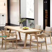 Vente en gros de chaise de salle à manger nordique moderne en bois massif frêne fauteuil de salle à manger rembourré avec coussin rembourré pour appartement et maison