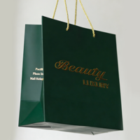 Boîte cadeau luxe avec impression de logo par estampage à chaud, sac en papier pour bijoux (collier, bague, bracelet) avec poignée en nylon.