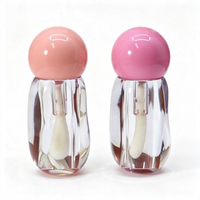 Tube de gloss transparent à effet d'ondulation irrégulière, avec bouchon sphérique, emballage vide pour gloss