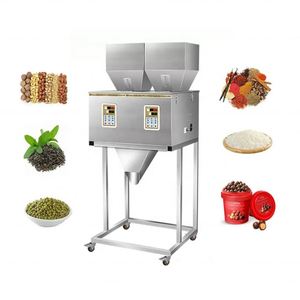 Machine de pesage et de remplissage de petits sachets pour épices, noix, céréales, poudres sèches et sel, avec double trémie doseuse, machine d'emballage et moteur principal - Product Image 1