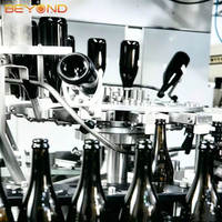 Machine automatique de remplissage et de ligature de bouteilles de champagne et de vin 2000BPH pour bouteilles de 330ml, 500ml, 650ml