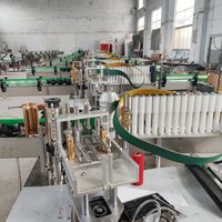 Machine d'étiquetage entièrement automatique pour les aliments en conserve, les détergents à lessive et l'huile d'olive