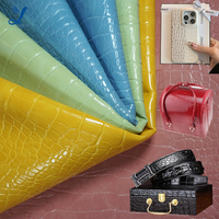 Vente directe usine Tissu en cuir PVC coloré à motif crocodile 1.0 Double aiguille Fond brossé Anti-plis pour mobilier
