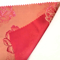 Tissu jacquard tissé de haute qualité avec un motif floral délicat pour robe de soirée pour femmes
