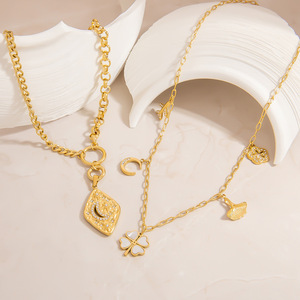 Collier chaîne claviculaire en acier inoxydable avec pendentif trèfle à quatre feuilles pour femme, bijoux de fête, design multicouche doré - Product Image 1