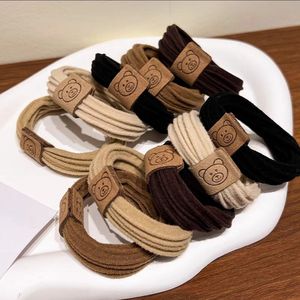 Coletero de cuero con diseño de oso, banda elástica de alta elasticidad, accesorio duradero para el cabello con forma de moño. - Product Image 3
