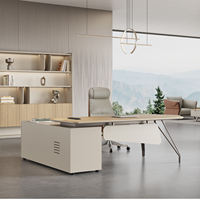 Bureau de direction en L haut de gamme : MDF avec laminage thermique, bords arrondis doux, gestion intégrée des câbles et quincaillerie robuste