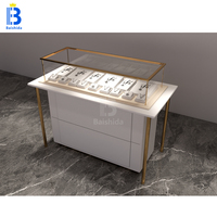 Table de présentation de bijoux de luxe minimaliste avec vitrine et armoire de rangement pour magasin de bijoux haut de gamme