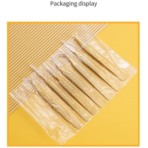 Pinzas para pestañas con textura de red de pesca, pinzas para pestañas postizas, pinzas para extensión de pestañas, rizador de pestañas con plumas doradas. - Product Image 4