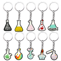 Llaveros al por mayor de goma suave de PVC con diseño de vaso de laboratorio y tubo de ensayo, ideales para niños y adultos, con temática de ciencia y química.
