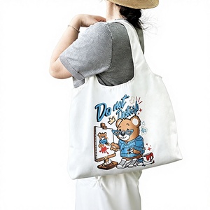 กระเป๋าผ้าแคนวาสลายการ์ตูนสำหรับผู้หญิง ใช้ได้ทุกโอกาส เหมาะสำหรับนักเรียน พกพาสะดวก ใช้ใส่อาหารกลางวัน ปิดปากกระเป๋าแบบเปิด ฤดูร้อน 2023 - Product Image 1