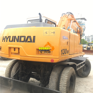 Excavatrice sur pneus de 20 tonnes Hyundai Robex 130W d'occasion avec lame hydraulique, marteau hydraulique et moteur - Product Image 1