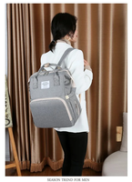 Sac à dos multifonctionnel de voyage pour maman, avec lit pliant et port USB, sac à langer pour bébé avec table à langer intégrée - Vente en gros