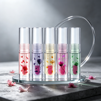 Vente en gros de rouge à lèvres liquide longue durée personnalisé à la vitamine E, brillant à lèvres hydratant aux extraits de fleurs et de plantes, huile de soin des lèvres quotidienne