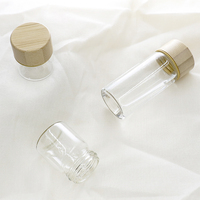 Botol penyimpanan borosilikat tinggi Mini 30mm kustom dengan tutup bambu kaca teh kapasitas kecil Cordyceps Sinensis