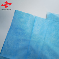 Rouleau de tissu non tissé en polypropylène (PP) pour la fabrication de bonnets jetables