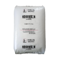 Granulés de résine vierge LLDPE DFDC7050 Sinopec, qualité film soufflé, incolores, haute brillance, haute résistance, 25 kg/sac