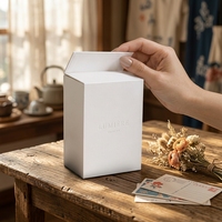 Boîte cadeau magnétique blanche haut de gamme pour soins de la peau avec couvercle et base en carton gris finition mate pour emballage cosmétique personnalisé