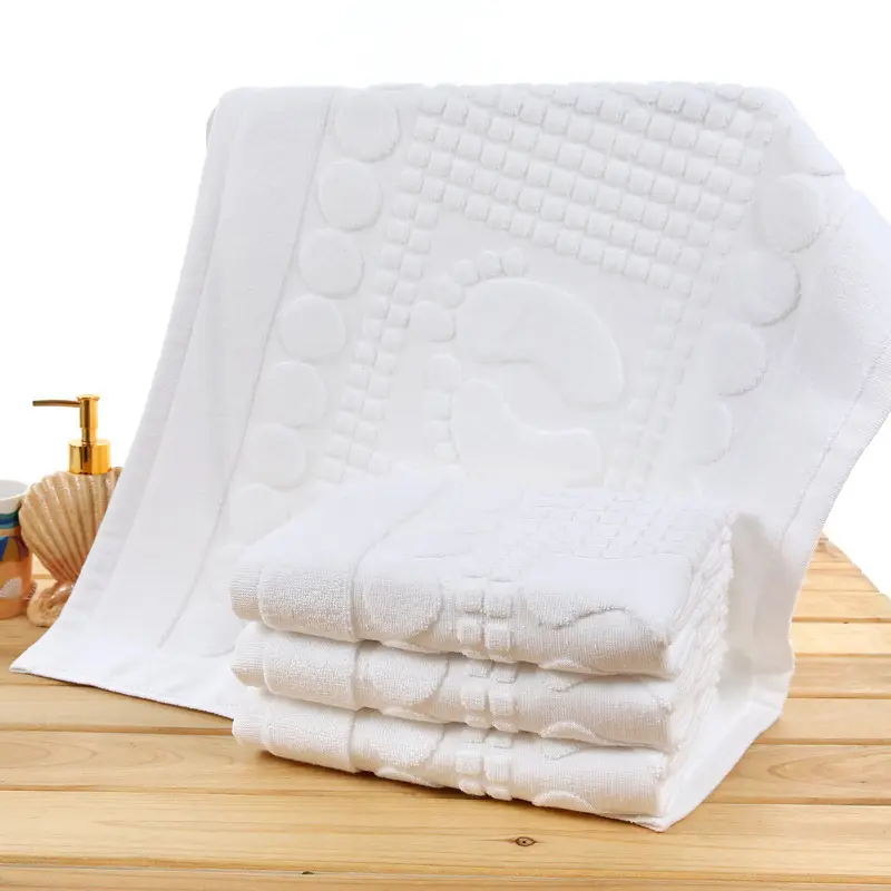 Vente en gros de tapis de bain épais en éponge 100% coton pour la maison serviette de pied antidérapante pour la douche tapis de bain d'hôtel
